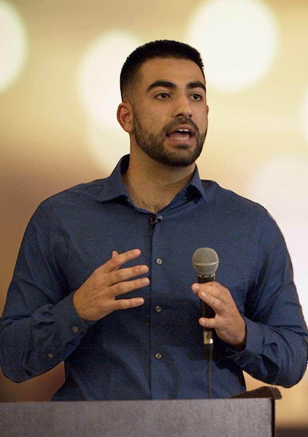 Amin Shaykho giving a talk at the University of California.
